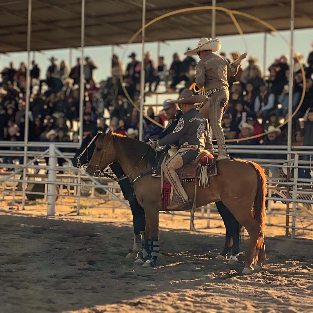 Charro Escamilla standing on a horse back
